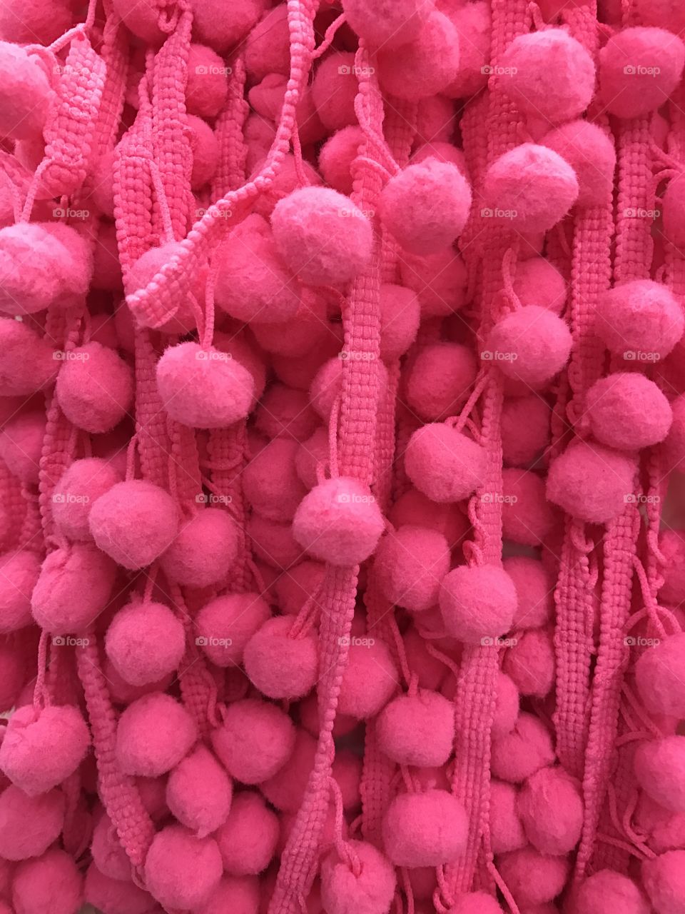 Close-up of pink pompoms
