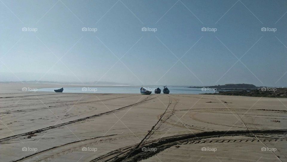 Beautiful boats near the beach.