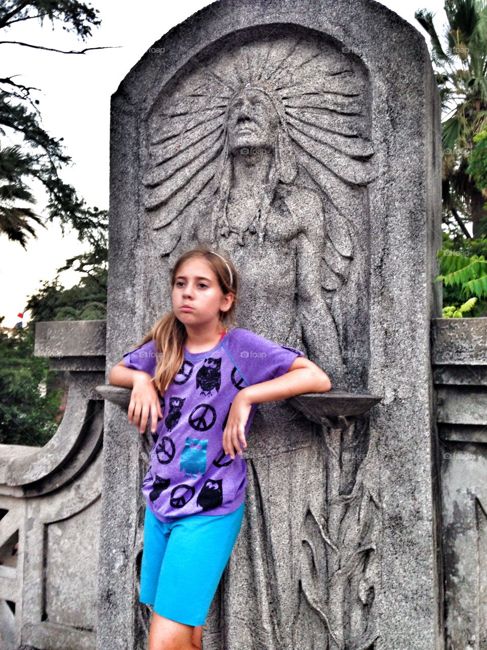 Stone faced. Serious picture of a girl with stone art