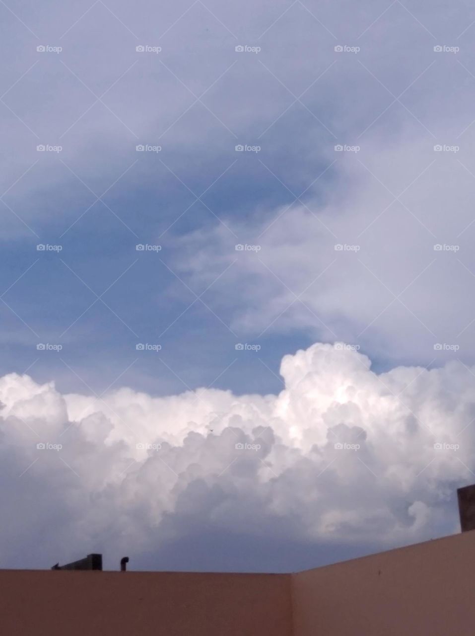 a rainy day white clouds whites shining slightly blue sky whitish cloud scattered looks very beautiful