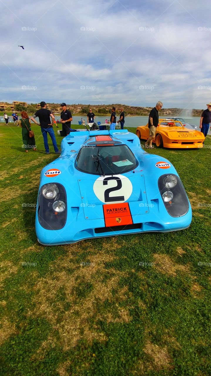 Race cars displayed during a early spring auto show in Arizona.