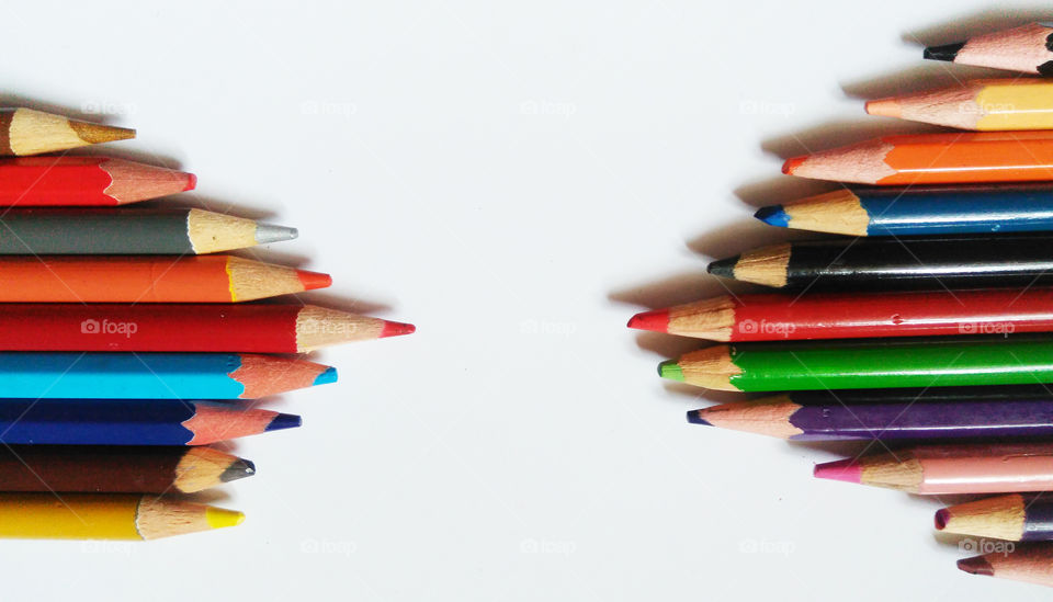 Color pencils against white background