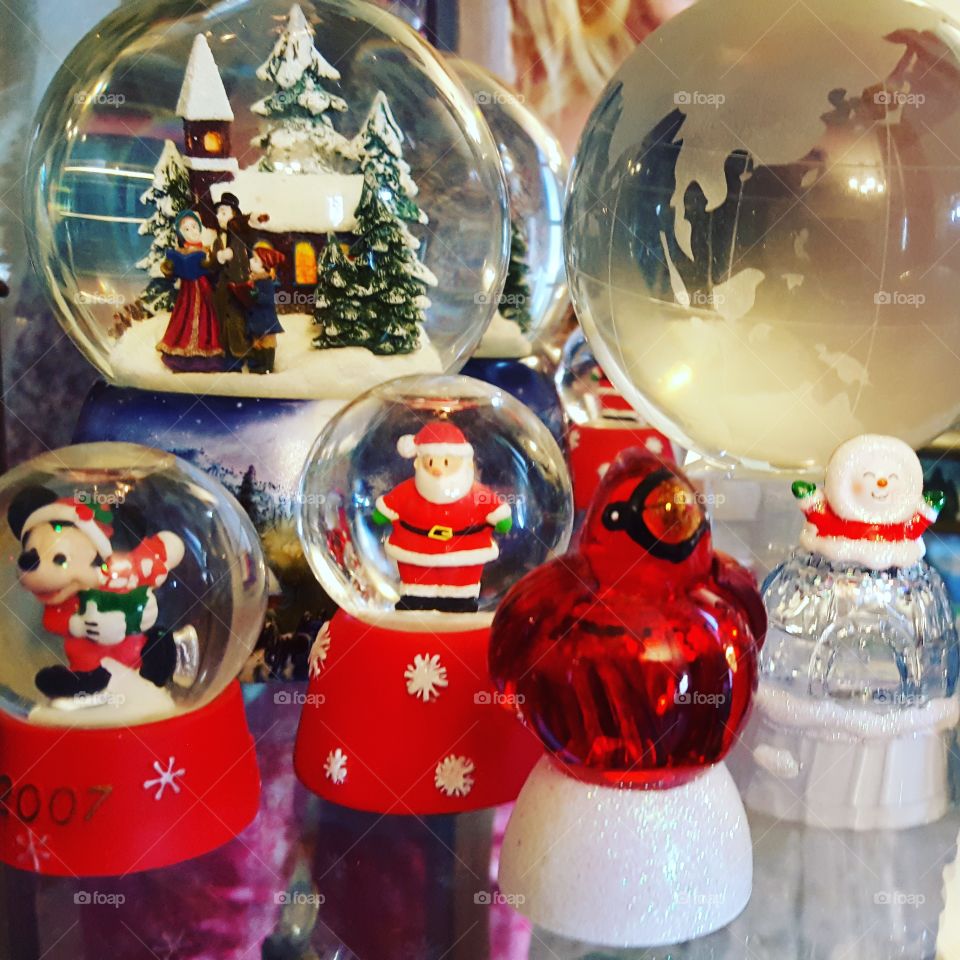 A collection of snowglobes brighten up not only the home but the faces of children with all the happy holiday scenes.