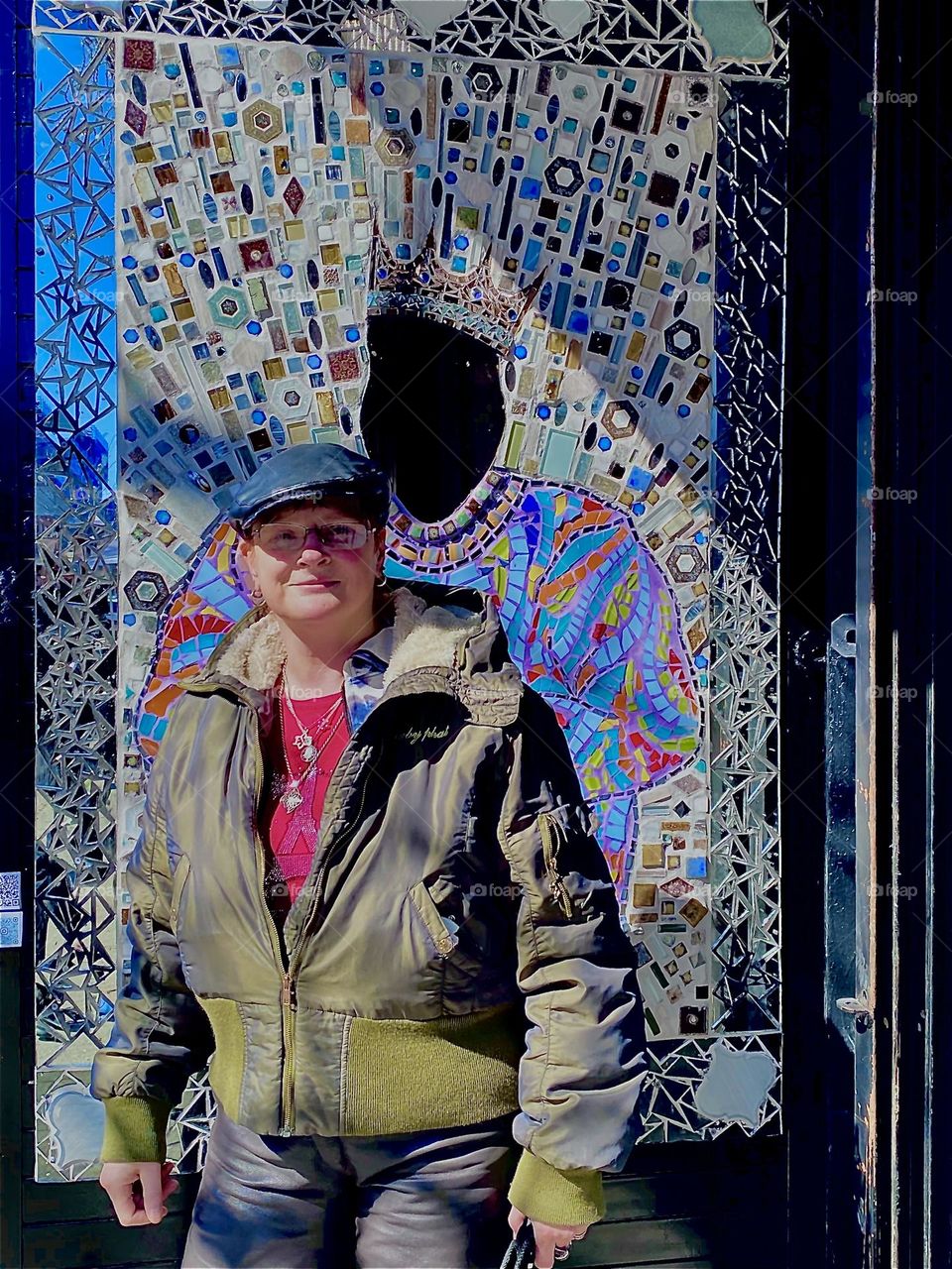 The “Notorious B.I.G.” mosaic features a cutout with a mirror behind it just below the crown in the mosaic. But you must be at least as tall as “Biggie” so you can see yourself in the king’s place. Obviously I’m too short. 2023. Hypnotic Productions