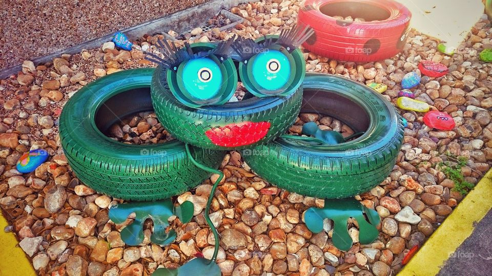 recycle tires elementary school south Texas playground frog worms ladybug warm rocks garden