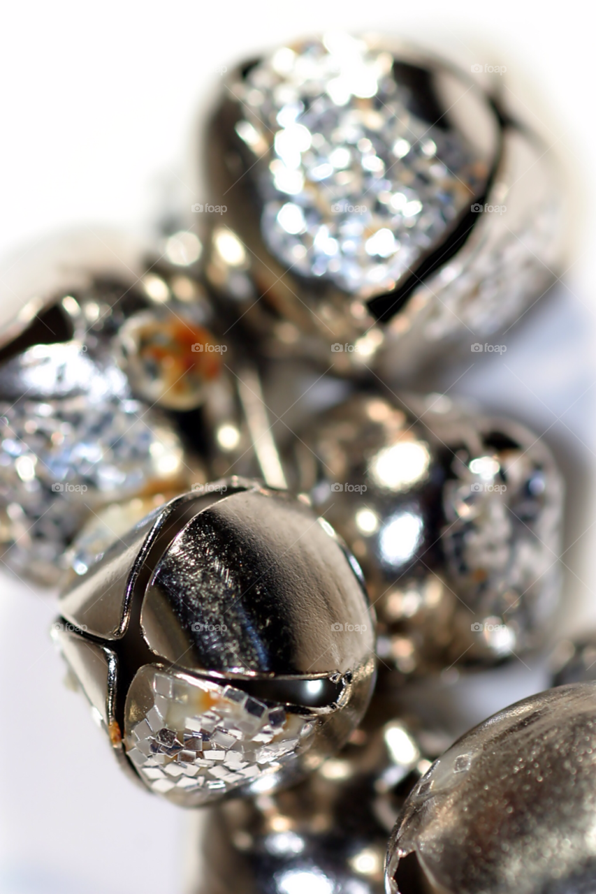 Bells
Silver shiny bells close up on white background