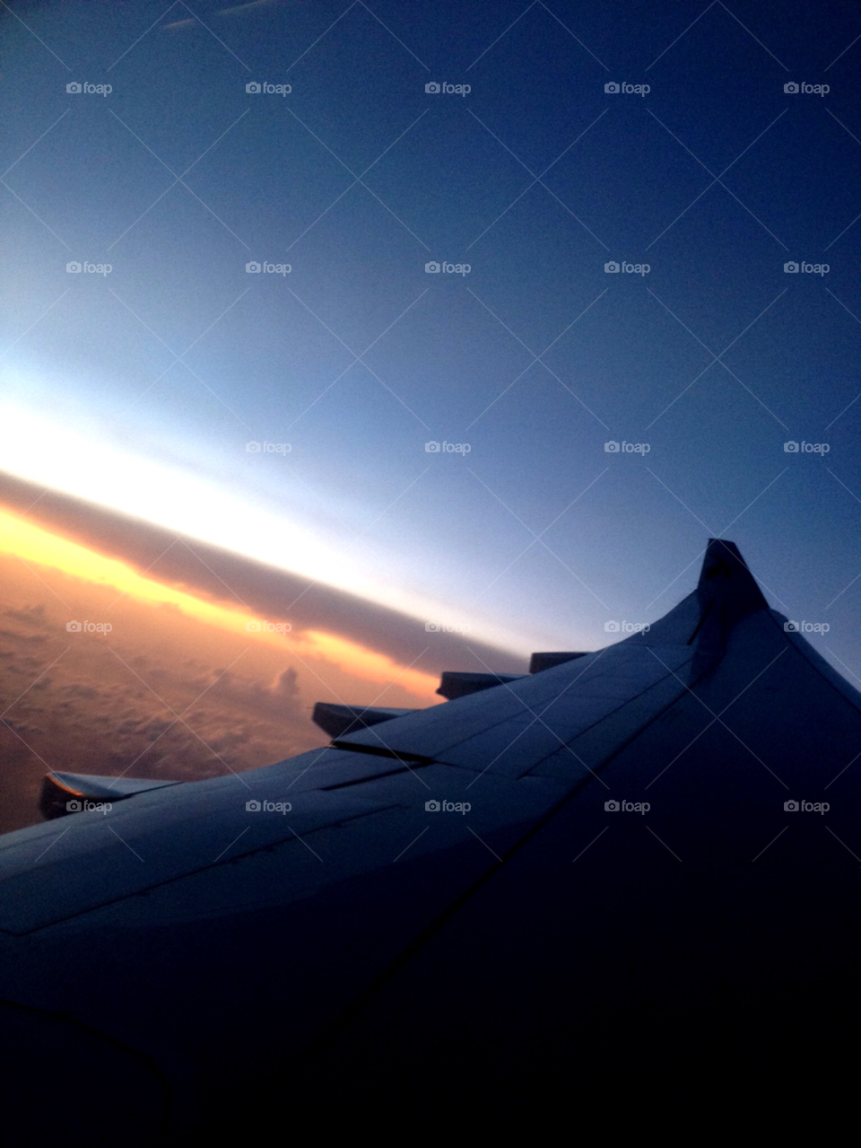 sunset plane qatar airways up in the air by brunhilda