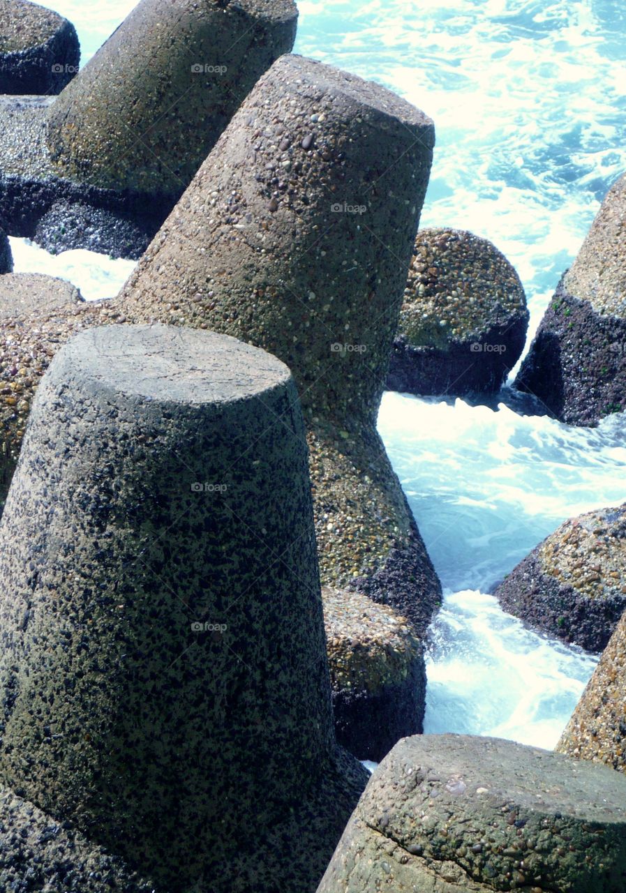 An image of stone barriers in Alexandria, Egypt.