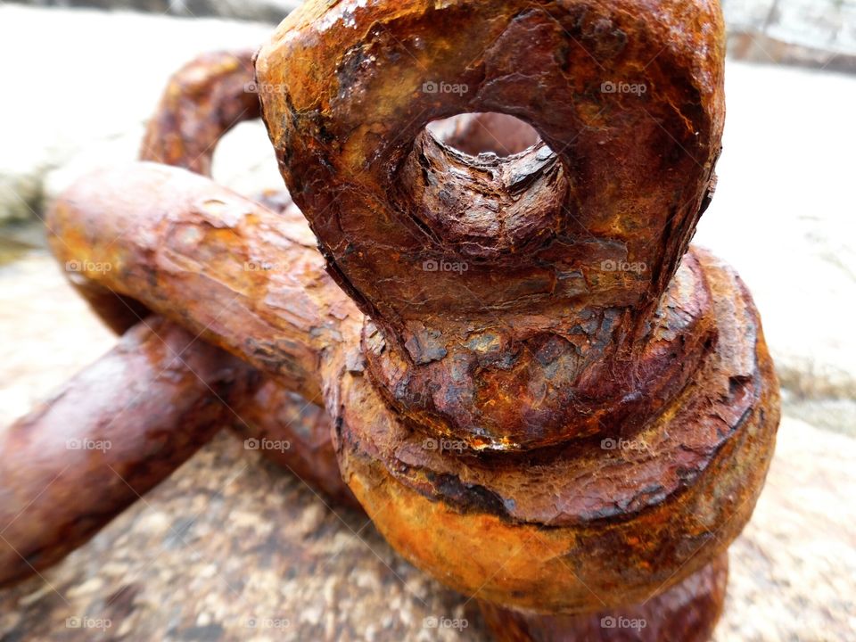 rusty metal shackles at abbey slip Penzance Cornwall