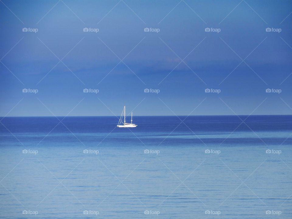 Sailboat in the sea of Cape D'Arena ( Palinuro - Italy ).