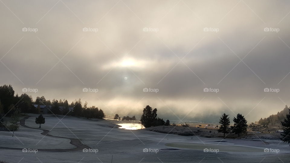 Fog rolling in...obscuring the sun.