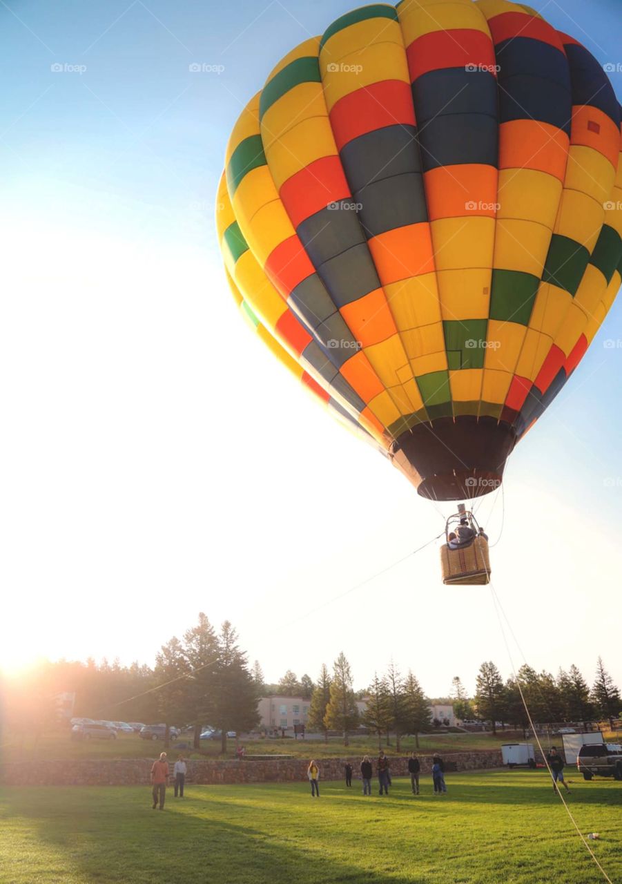 person riding hot air balloon