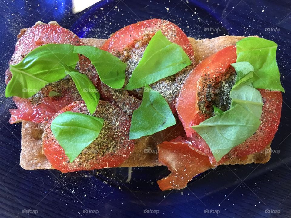 Tomato and basil on wasa Crispbread 