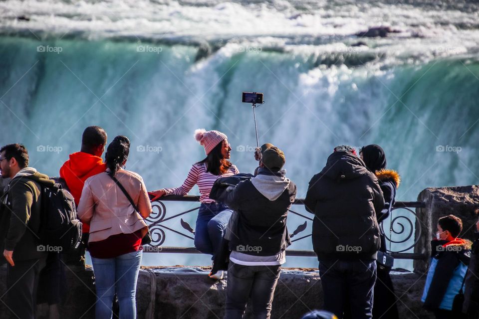 Taking a photo on a smart phone in Niagara