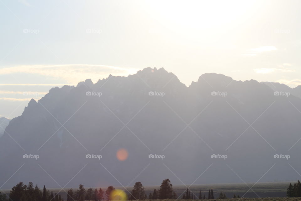 Sunray sun shining mountain lens flare outdoors scenic beautiful sunny mountains Outline nature landscape