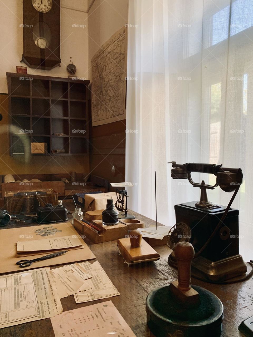 Vintage photo, retro styled phone on the desk