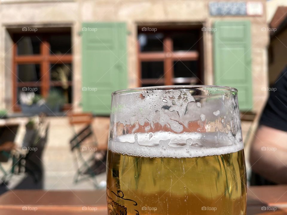 Close up of beer in glass in city