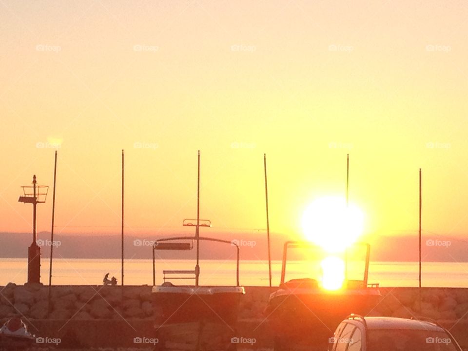 Sunset. Sunset behind the island