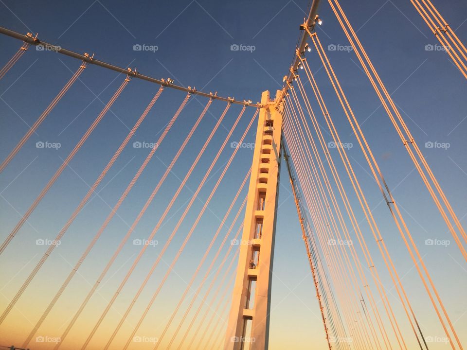 Bay bridge between SF and Oakland at sunset 