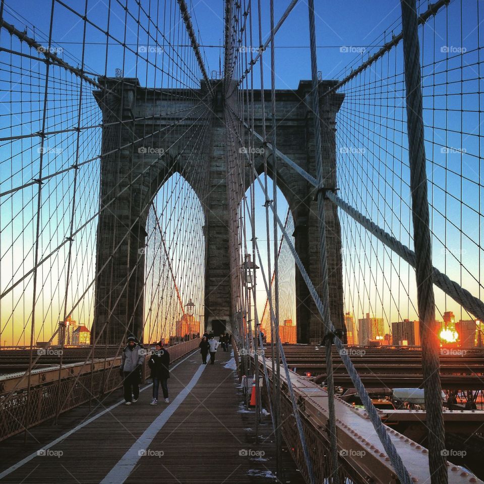Sunset on the Brooklyn Bridge, New York, United States. 
