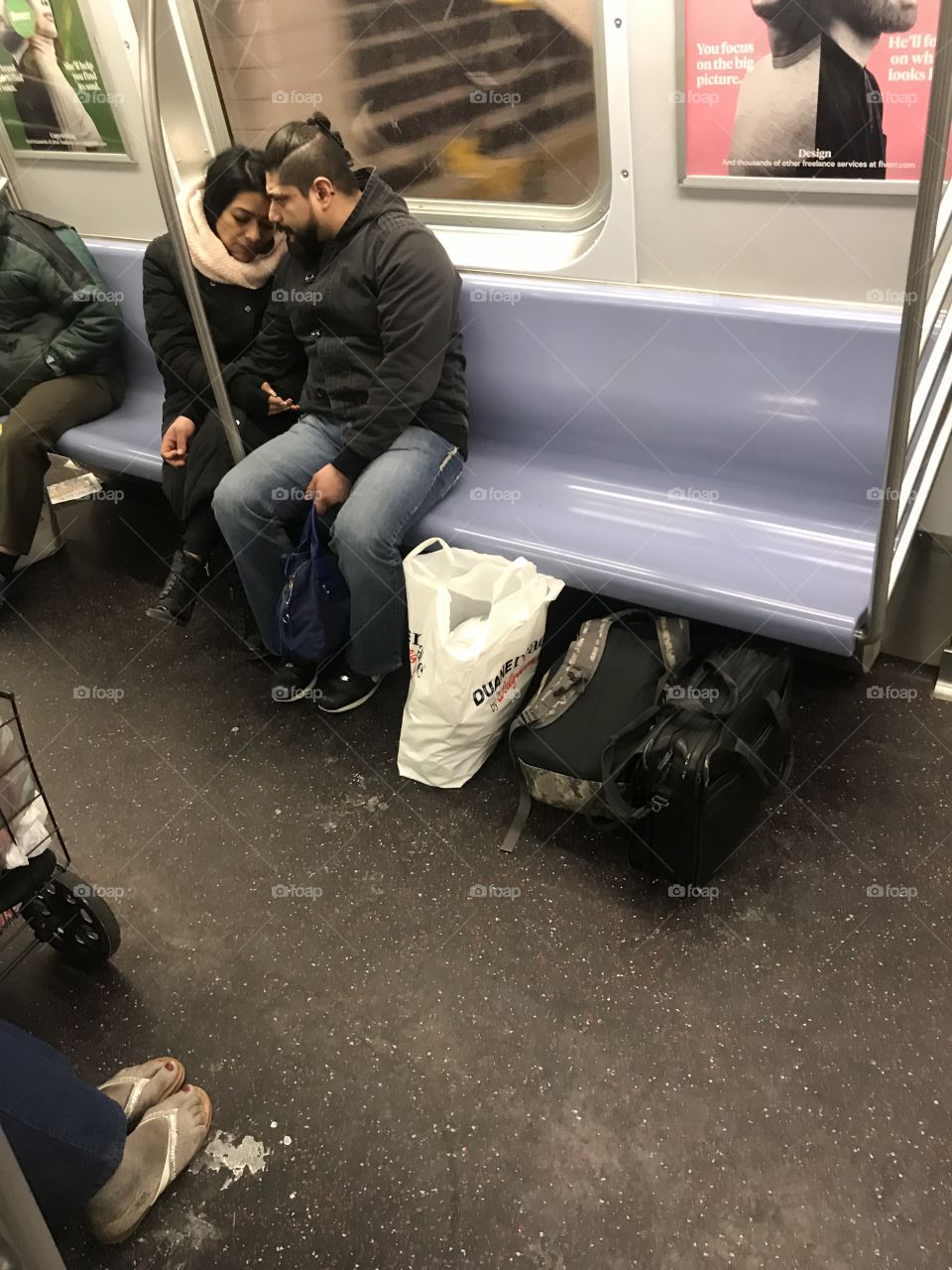 Snuggle bunnies on the uptown Queens bound E train at 2:25 AM. “All our dreams can come true if we have the courage to pursue them.” Walt Disney
