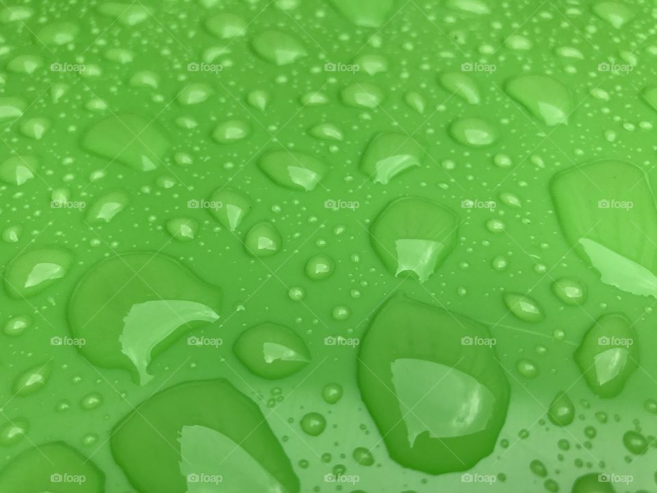 Green wet background with drops 