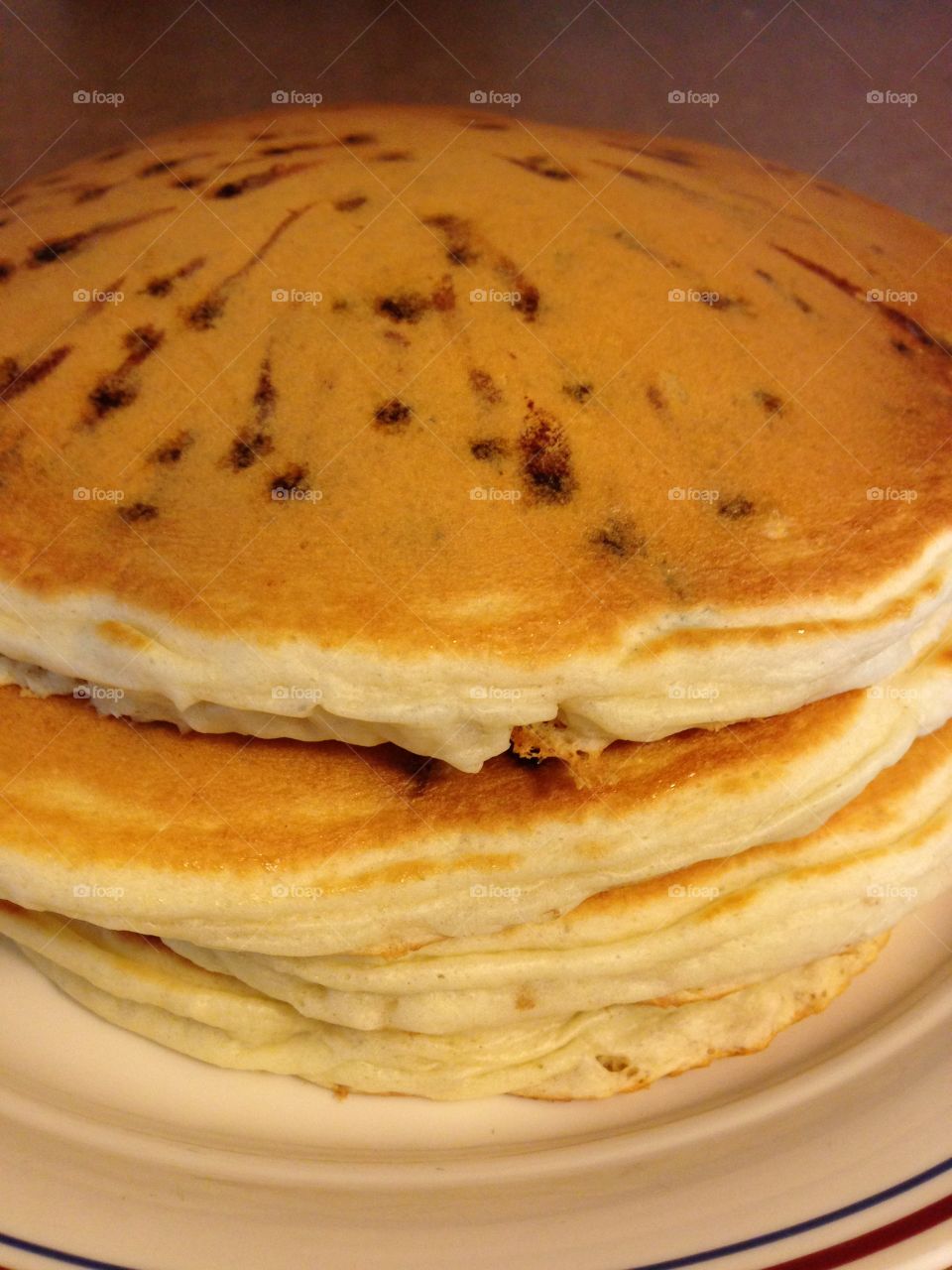 This is a stack of fresh chocolate chip pancakes.