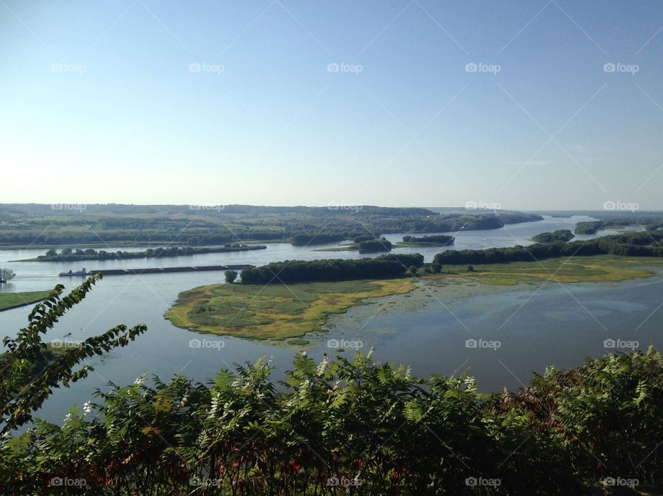 Serene overlook of a Midwest river on a warm summer afternoon in Illinois