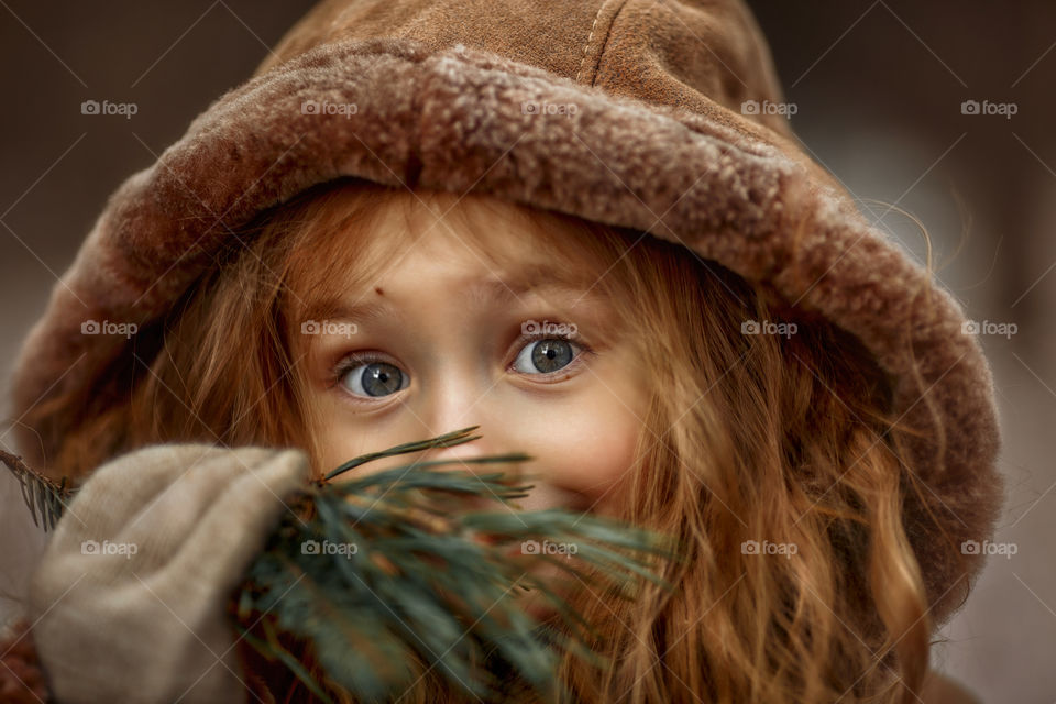 Little girl cute portrait with accent on the eyes