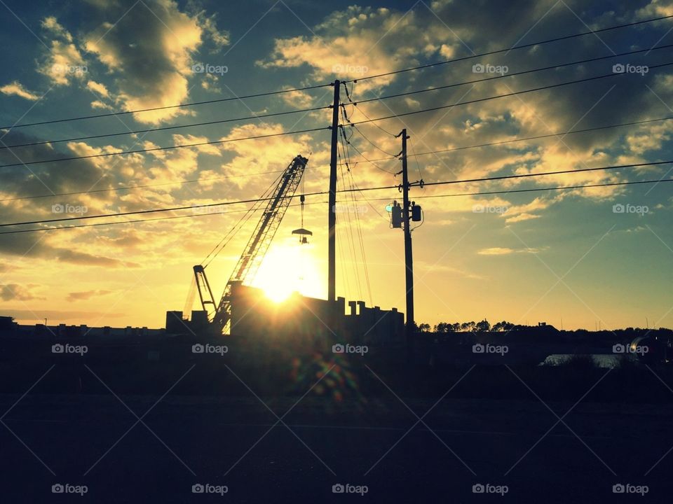 Hanging the sun with some heavy equipment 