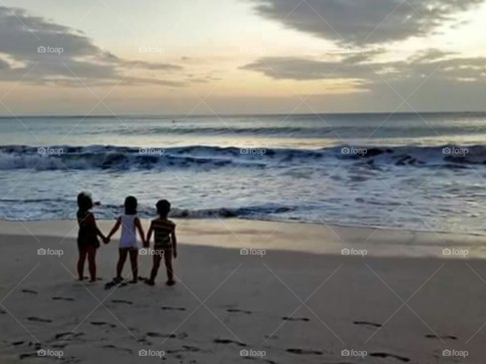 Jimbaran beach kuta bali island with 3 boy kid so friendly