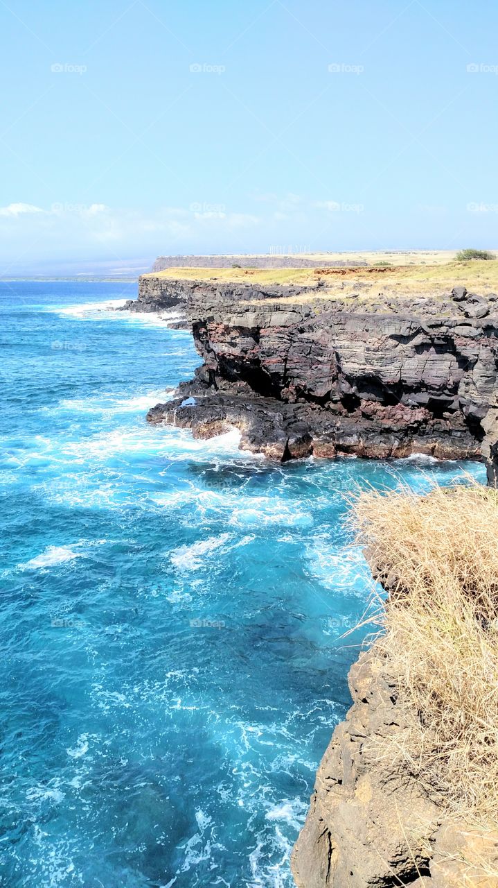 South point. Big island of Hawaii. southernmost point in the entire United States.  Blue water.