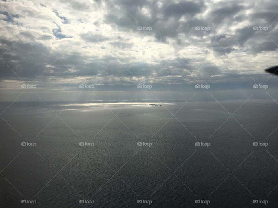 Capturing the sun rays escaping the cloud in the Maldives. 