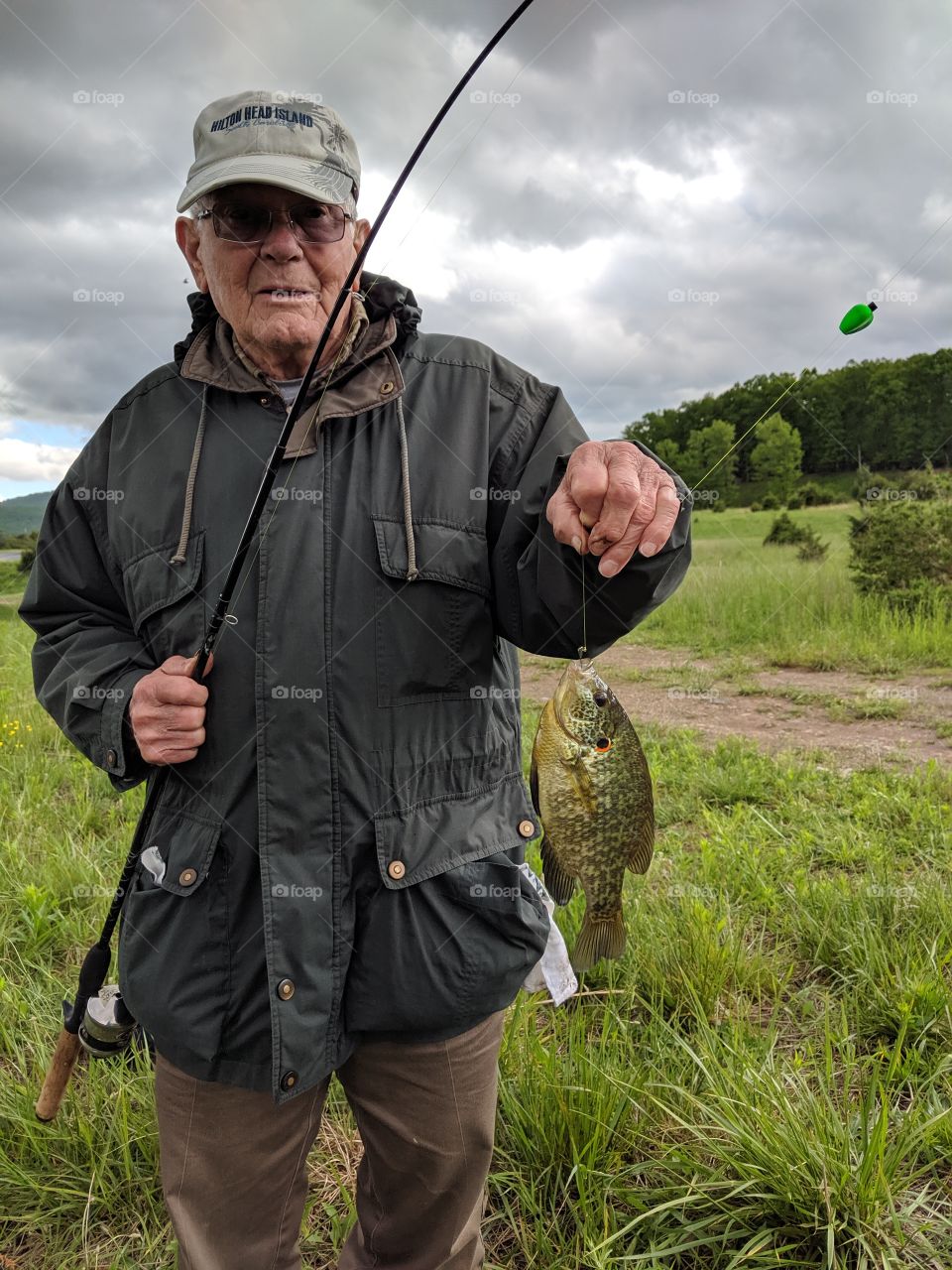 Grampa catching crappie in Kimpsey Lake, Lost River, West Virginia