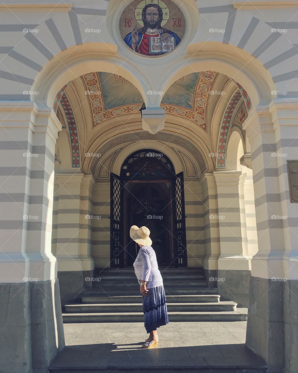 Woman near the church 