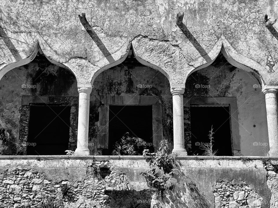 Arches in a wall in an old Spanish hacienda