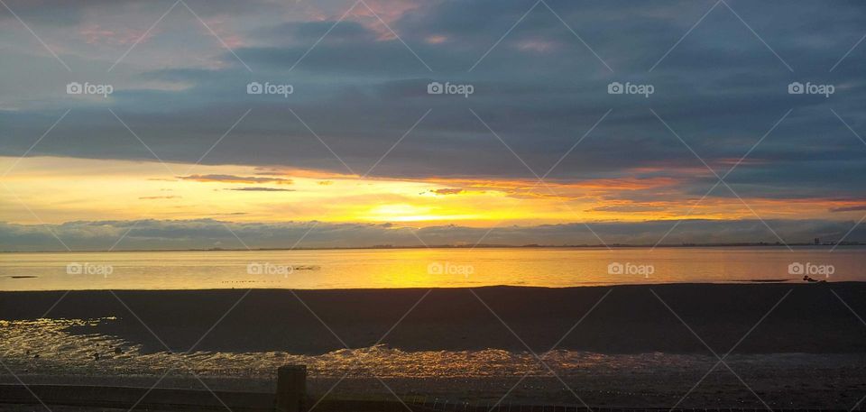 sunset reflections at the beach