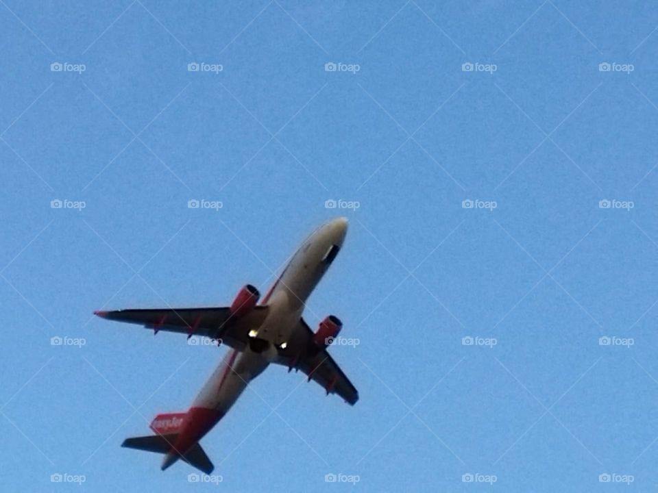 Beautiful airplane flying cross the sky