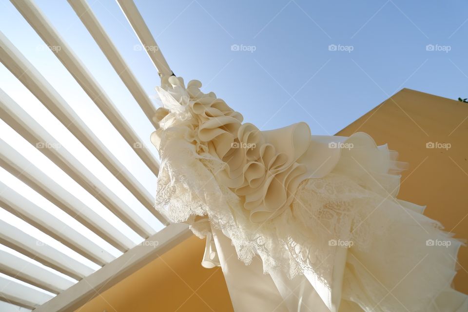Abstract unusual view dress. Unusual abstract view of a white bride bridal gown dress attire wedding