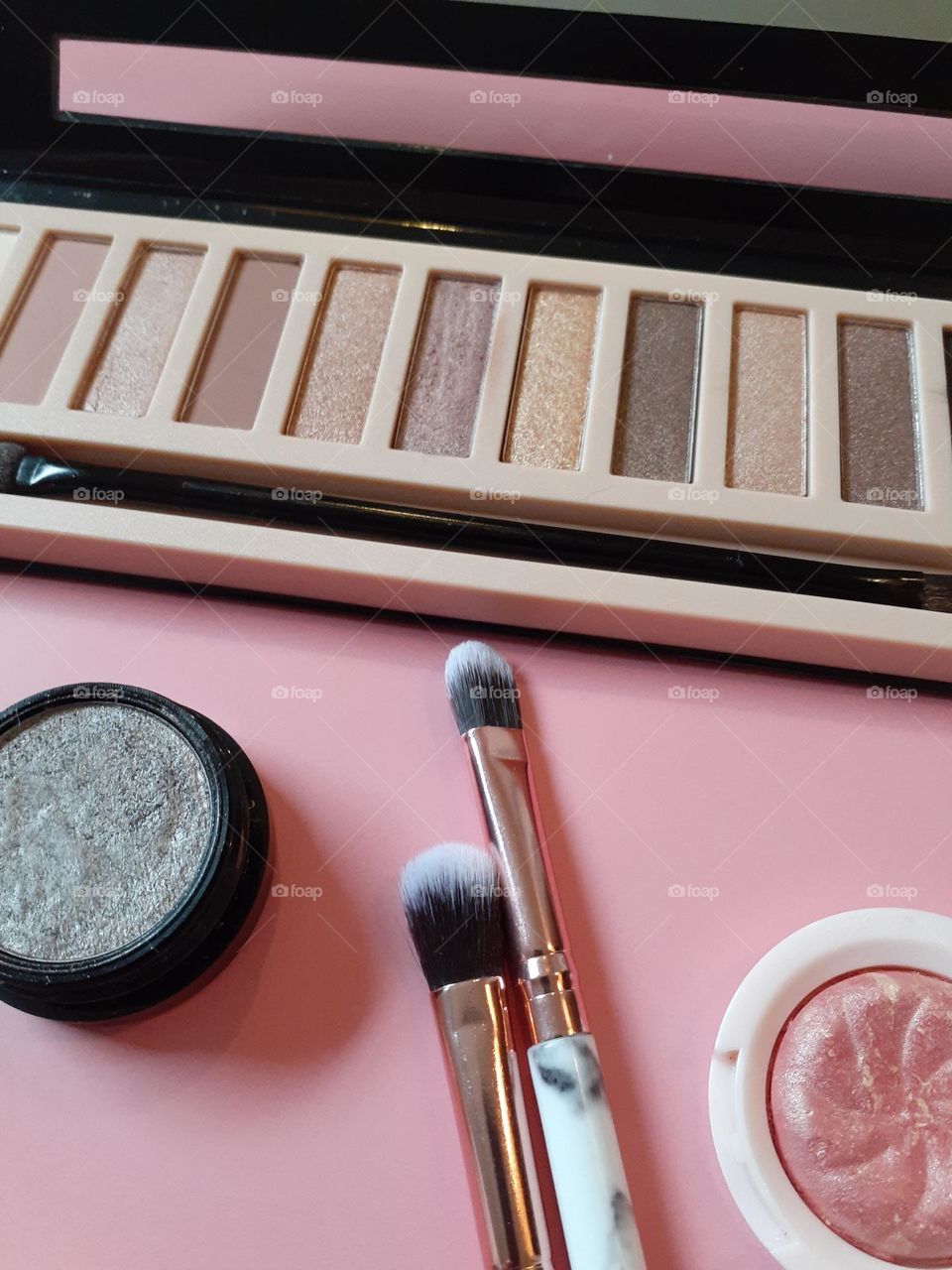 Some of my favorite beauty products are eyeshadow, blush, and lip color. Also pictures is some makeup brushes.