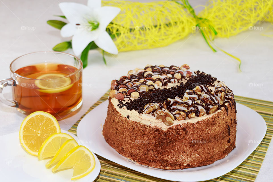 cake and a tea with lemon