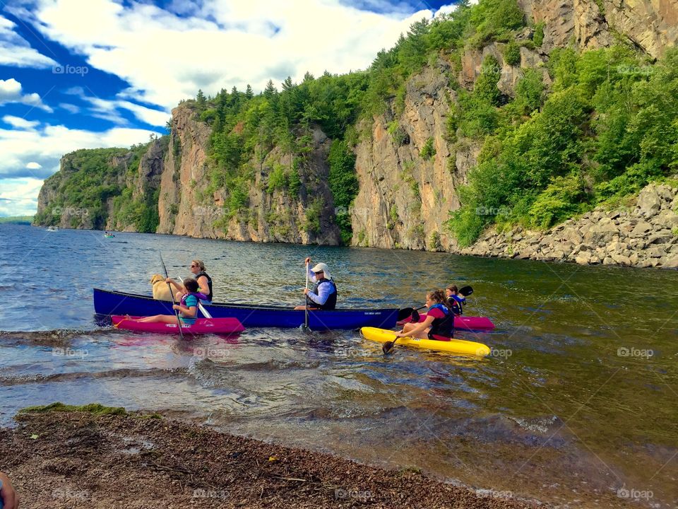 What a lovely view, seeing one family bonding, kayaking together. 