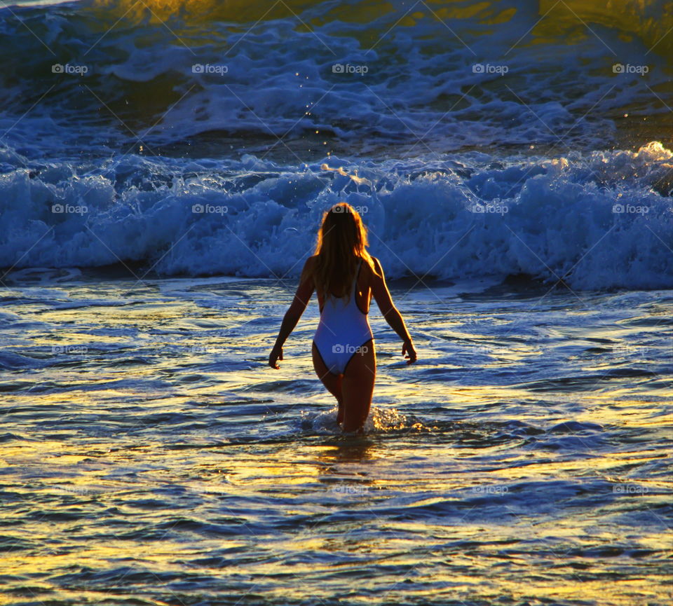 Sunset swimmer enjoying the