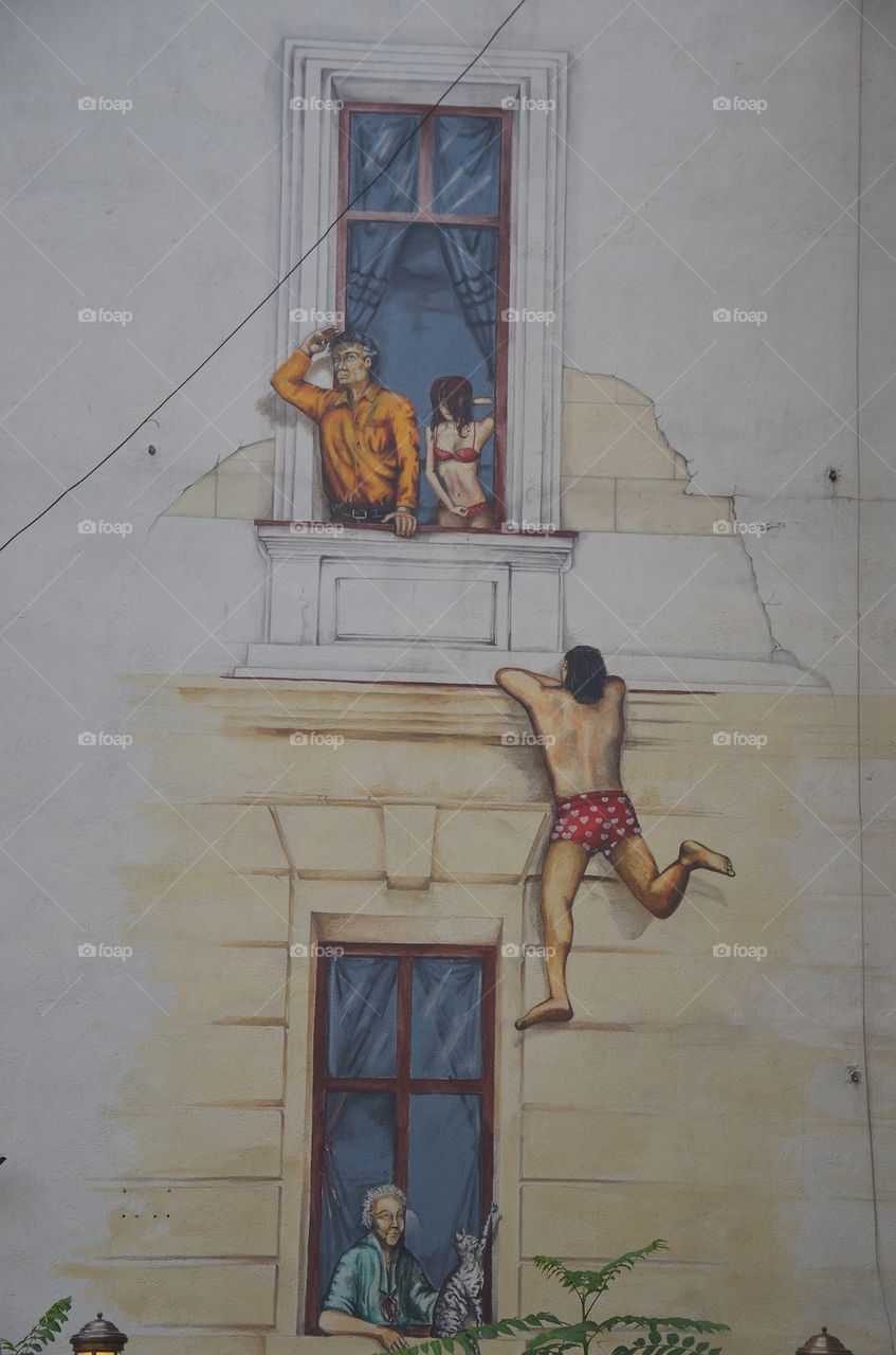 Secret lovers scene on a wall, Bucharest