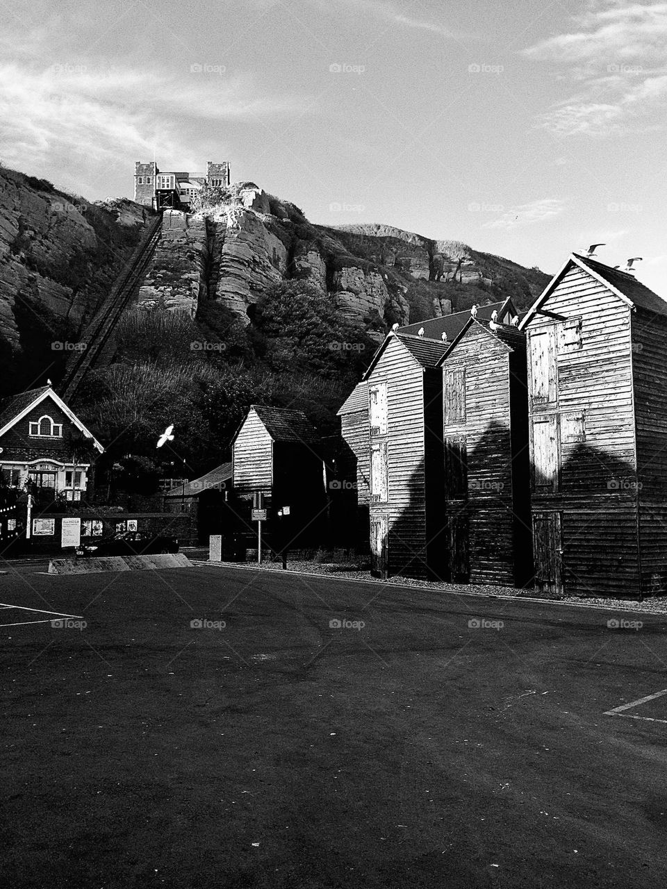 Fishing net huts and East Hill Cliff railway, Rock-a-Nore, Hastings, England. Experimenting for a more dramatic effect.