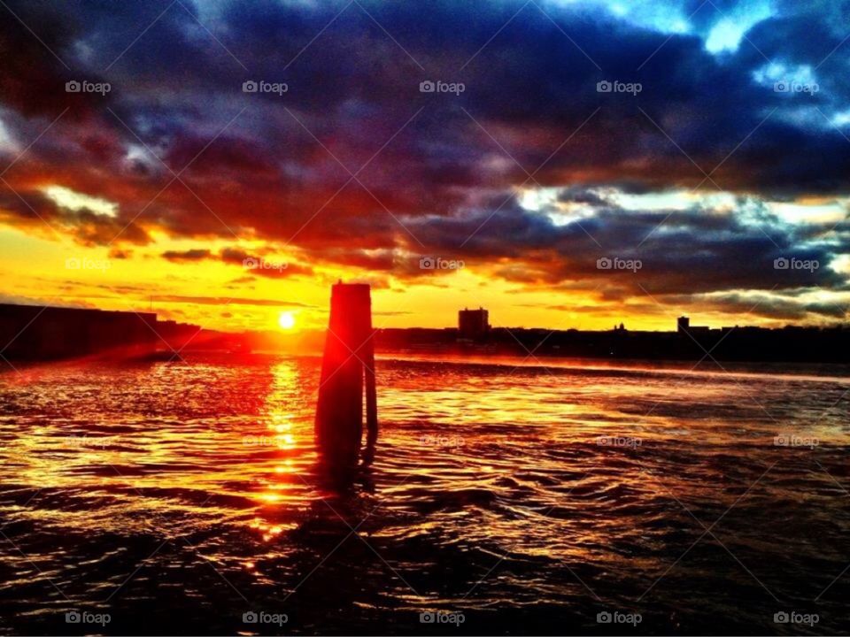 Sunset on the Hudson River, New York City.. Sunset on the Hudson River, New York City. iPhone photo.
