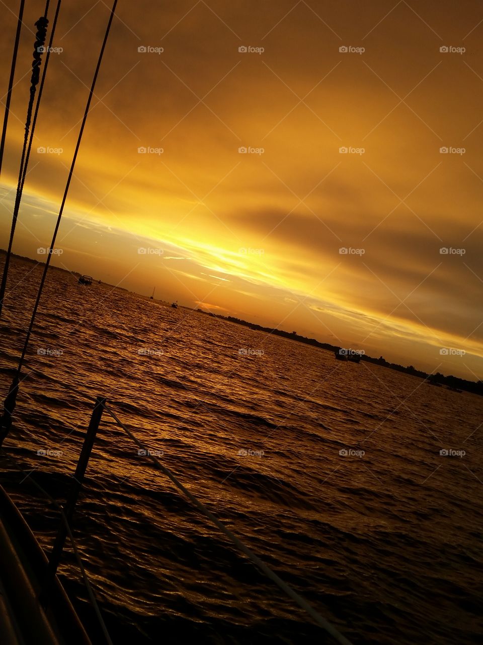 Sunset and sailboats. Manatee River.