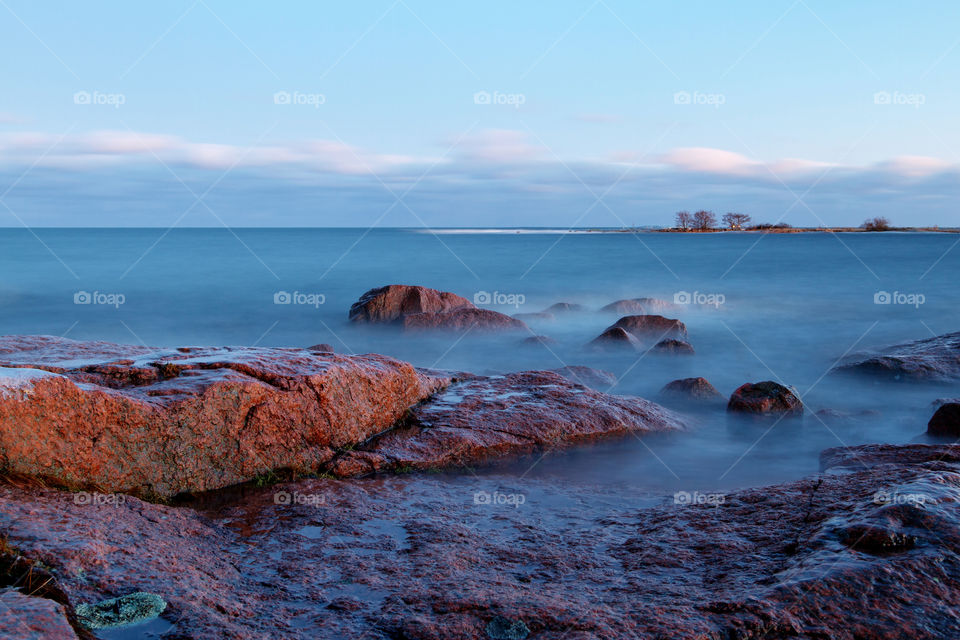 rocks waves smooth baltic sea by cls