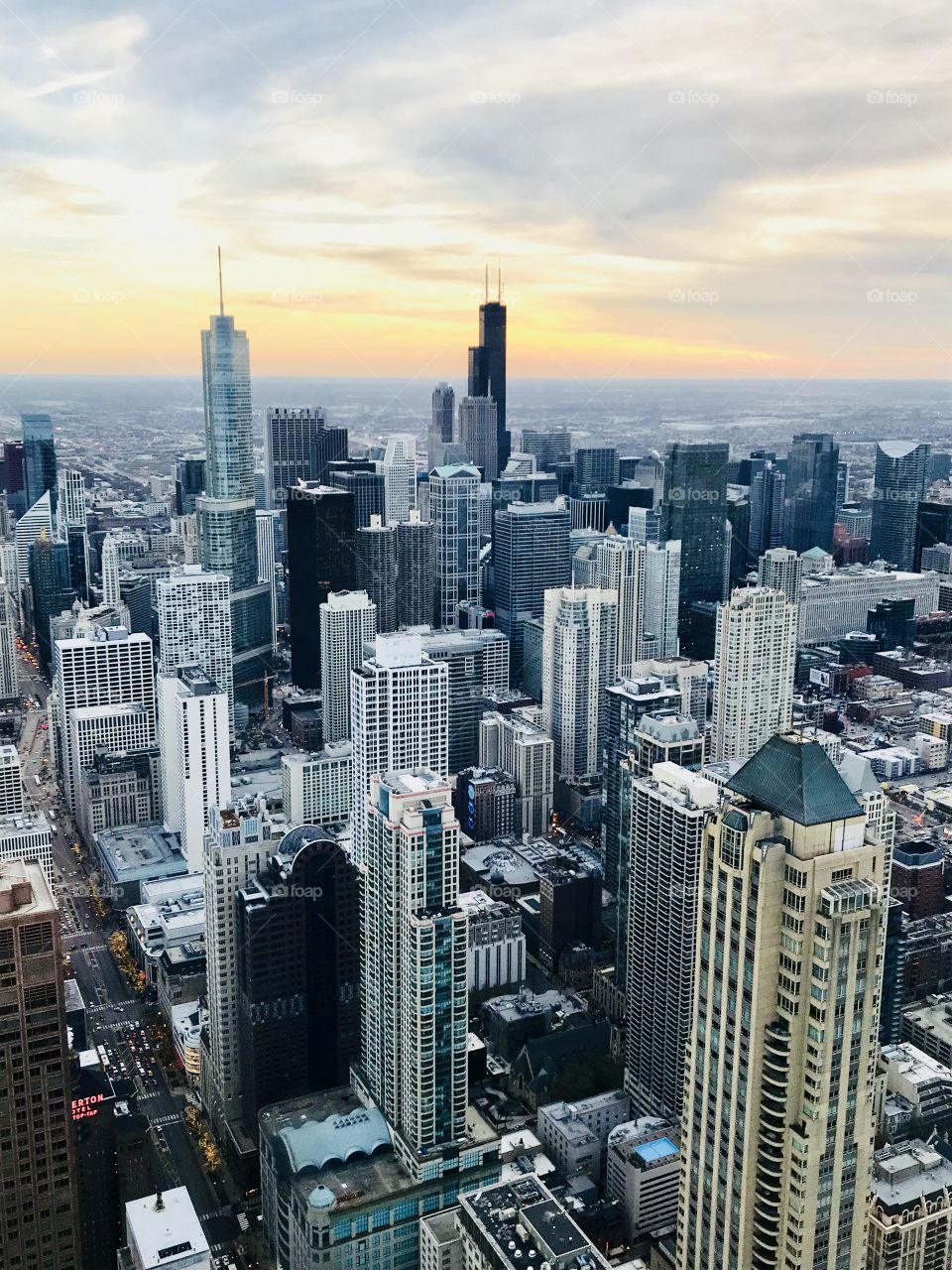 Chicago skyline from the 96th floor of the Signature Lounge in Chicago, Illinois at sunset 
