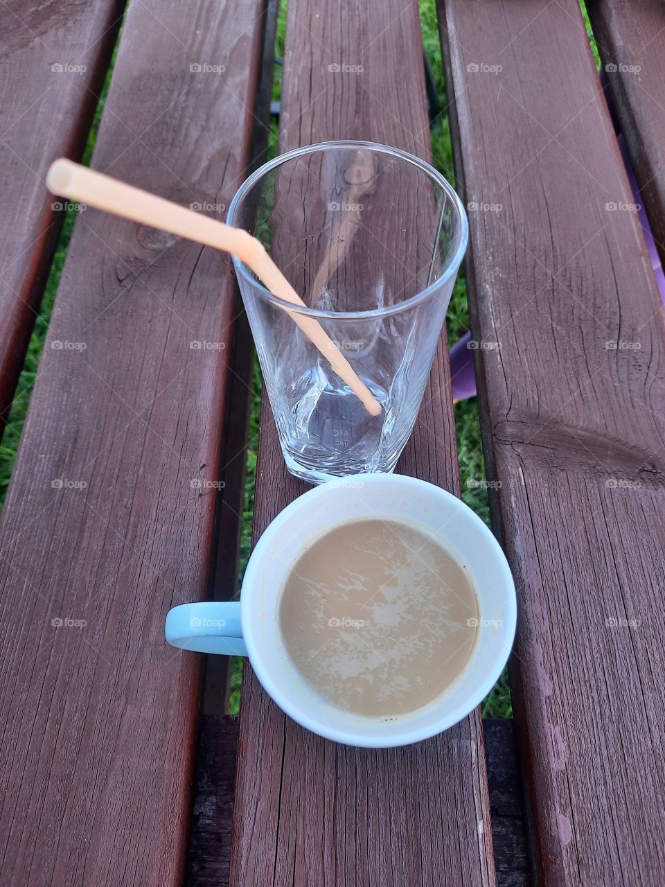 coffee  mug and glass on wooden table